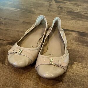 Cole Haan tan slip ons